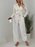 Anokhinaliza Striped Notched Long Sleeve Tie Waist Jumpsuit