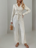 Anokhinaliza Striped Notched Long Sleeve Tie Waist Jumpsuit