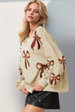 Anokhinaliza Double Take Christmas Bow Sequin Round Neck Dropped Shoulder Sweatshirt